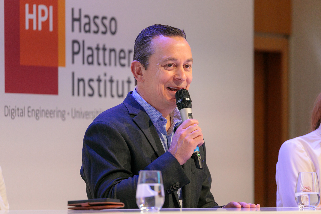 Experts discuss and debate together on the panel