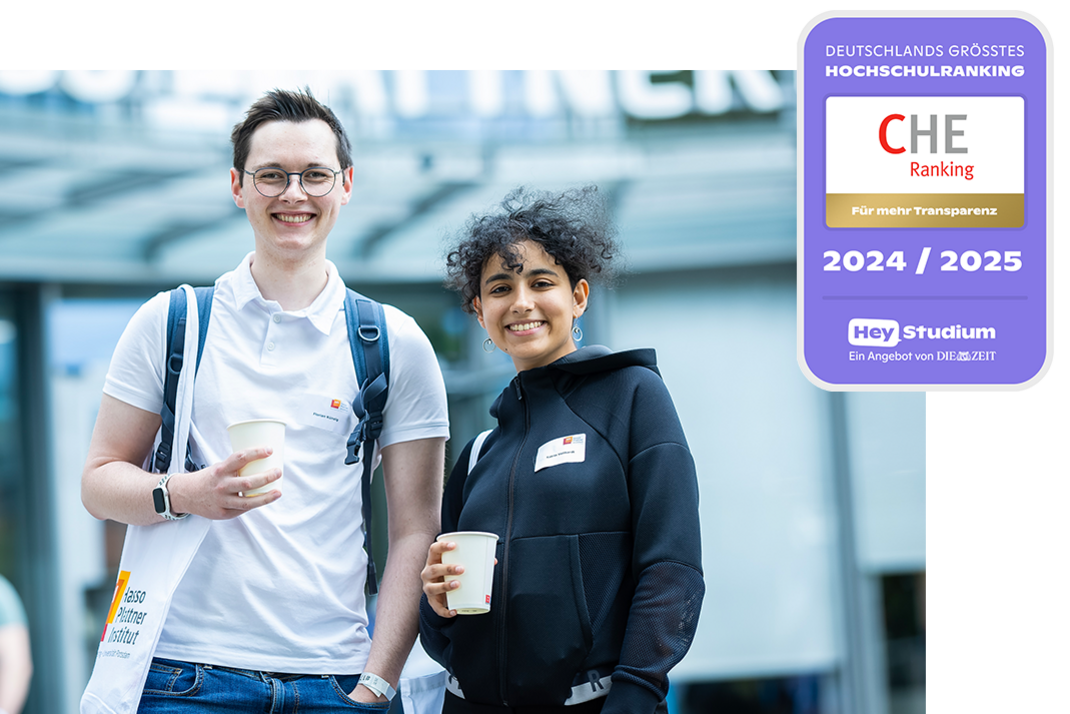 Two happy looking HPI students with a coffee mug. The CHE seal can be seen in one corner of the picture.