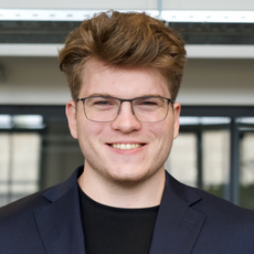 Portrait of AI@HPI Speaker and CTO and Co-Founder of the FloodWaive Predictive Intelligence GmbH, Adrian Holt
