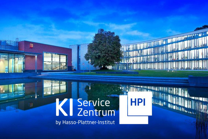 Main building of the Hasso Plattner Institute, large tree in front, small pond in the foreground.