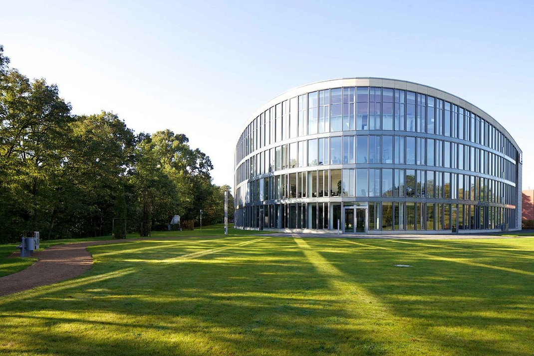 Exterior view of the HPI Institute building in summer