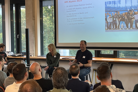 Head of Alumni Partners Sandra Willoh and HPI professor Ralf Herbrich introduce the HPI Alumni Network