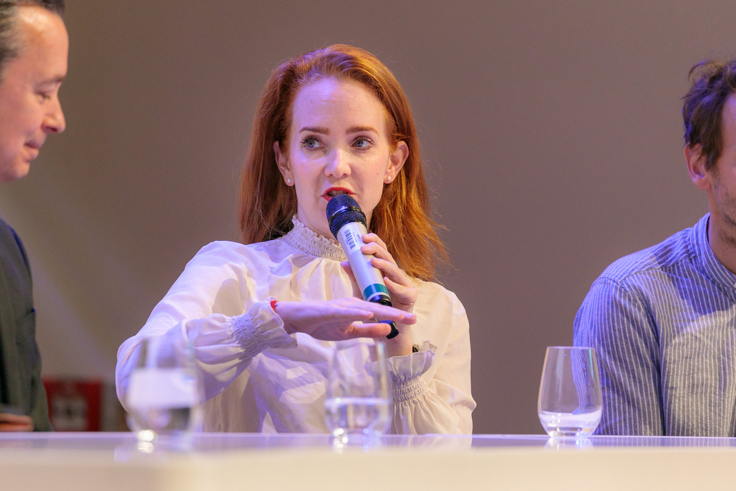 Experts discuss and debate together on the panel